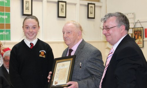 Noel Scarlette receives a special mememto